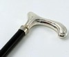 Walking stick with silver colored handle Walking stick with silver colored handle