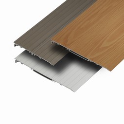 Wooden colored threshold ramps in aluminum