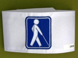 White armband with embroidered man