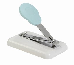 Nail clipper on a plate
