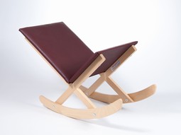Merry Foot tilting stool in wood