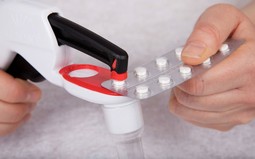 Pilleudtrykker med håndtag