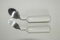 Queens spoon, angled for left hand Queens spoon, angled for left hand