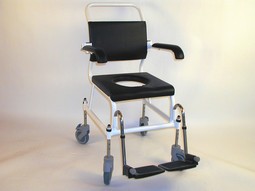 SOLI Commode & Shower Chair - example from the product group commode shower chairs with castors, non-electrical height adjustable SOLI Commode & Shower Chair - example from the product group commode shower chairs with castors, non-electrical height adjustable