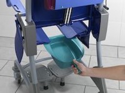 Carino, height adjustable shower and commode chair