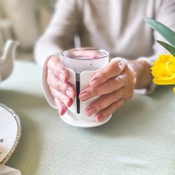 Etac Tasty Beaker with lid and a spout