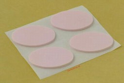 Self-adhesive pressure relief ring