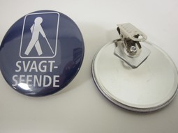 Badge blue with white mann andclips whit the lyrich:partially sighted