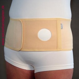 Ostomy belt with self cut hole
