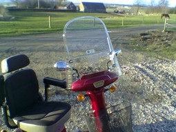 Wind shield for Karma electrical scooter - example from the product group wind shields for wheelchairs Wind shield for Karma electrical scooter - example from the product group wind shields for wheelchairs