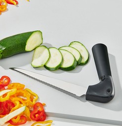 Vegetable knife with angled handle